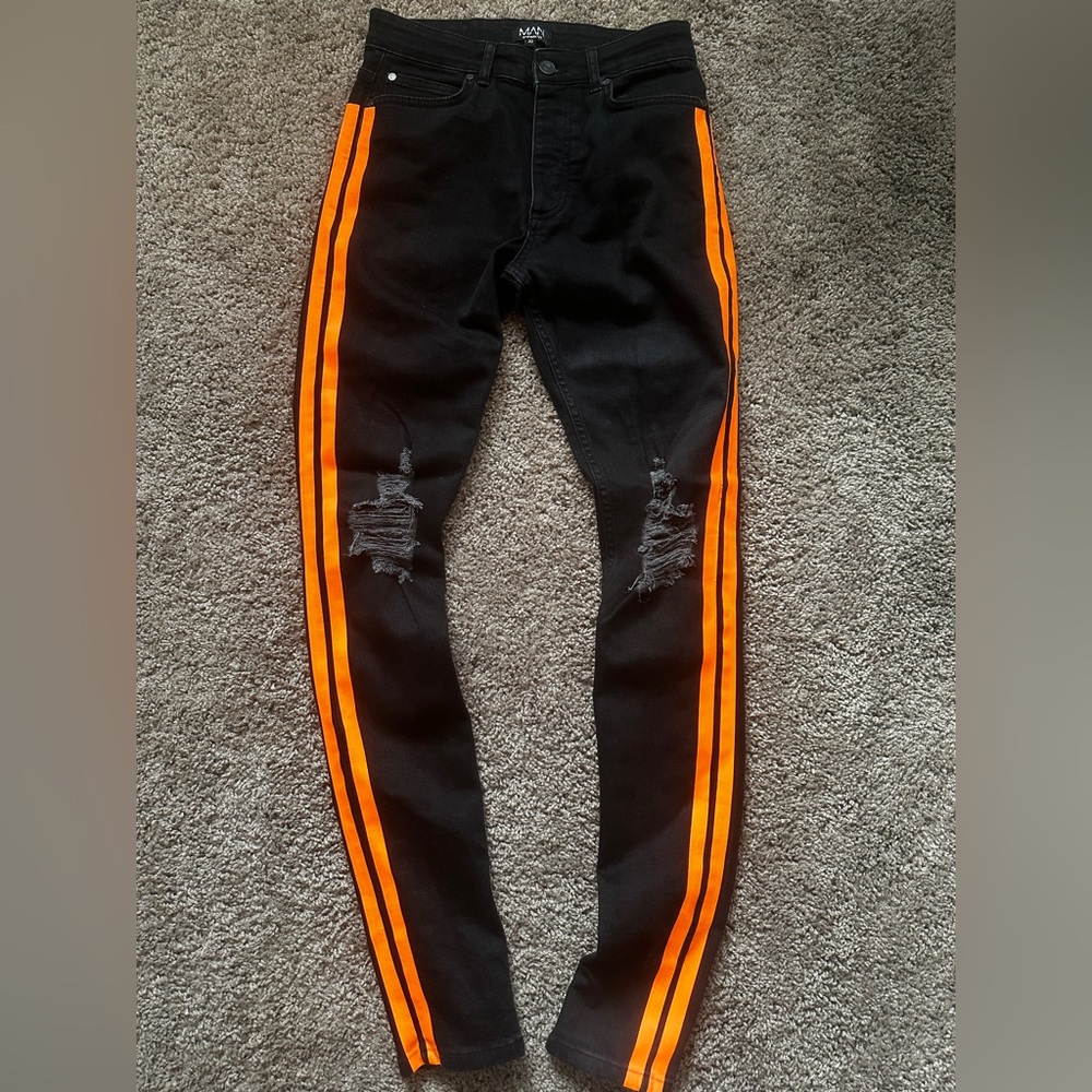 Black Skinny Jeans with Bright Orange Side Stripes
